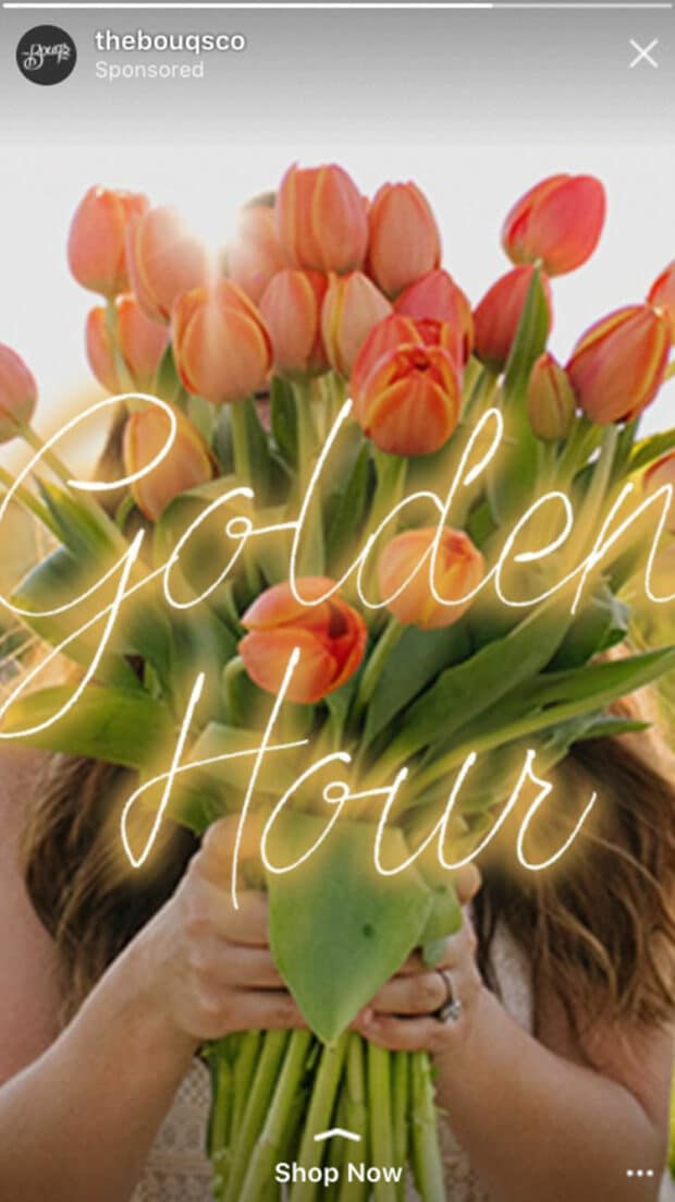 woman holding bouquet of flowers in instagram story using appropriate instagram video size limit