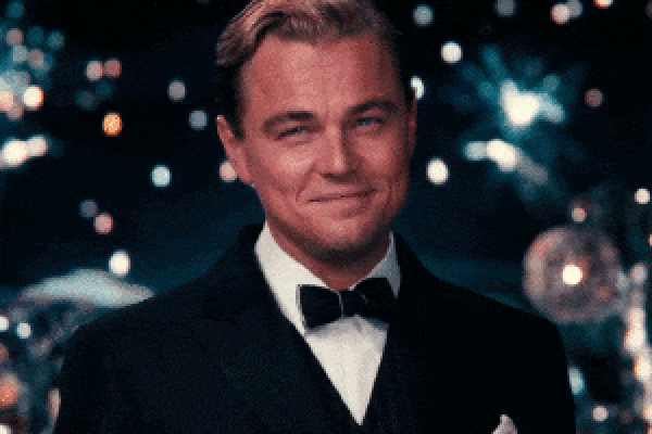 Leonardo DiCaprio cheers with glass