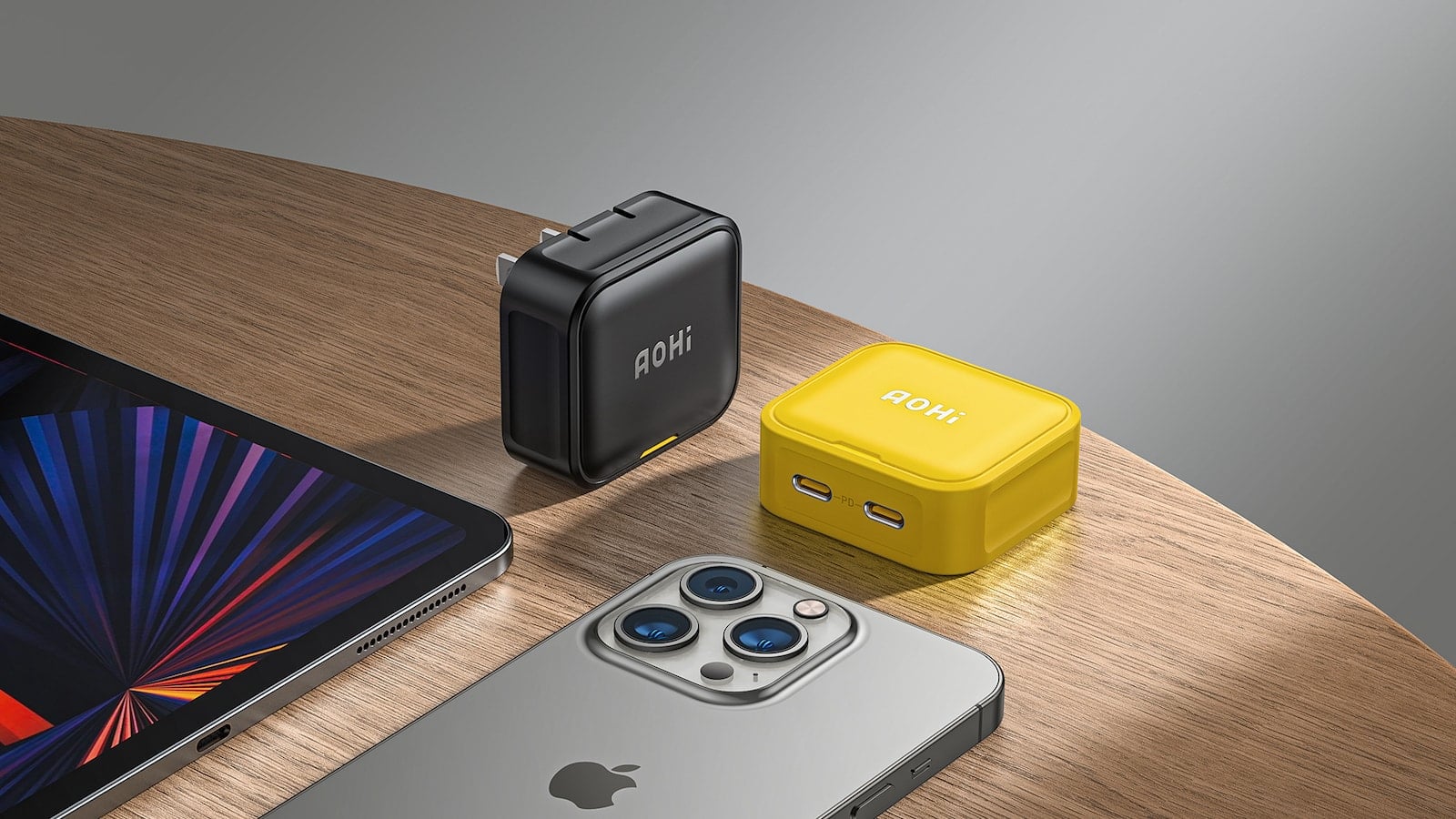 Fast charge two iPhone 13 smartphones at the same time with the AOHi Magcube 40W folding charger