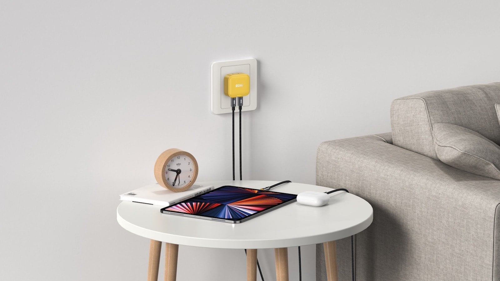 Fast charge two iPhone 13 smartphones at the same time with the AOHi Magcube 40W folding charger